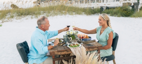 couple toasting on beach