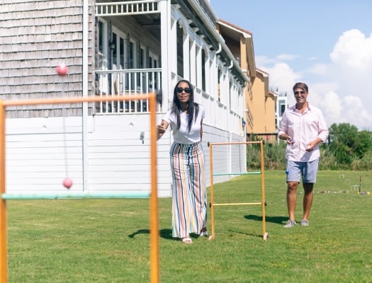 Couple playing lawn games