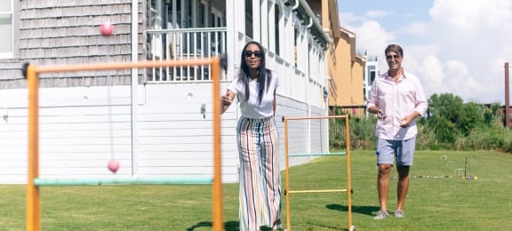 Couple playing lawn games