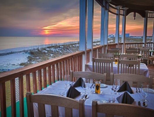 Outdoor dining with sunset view