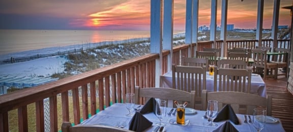 Outdoor dining with sunset view