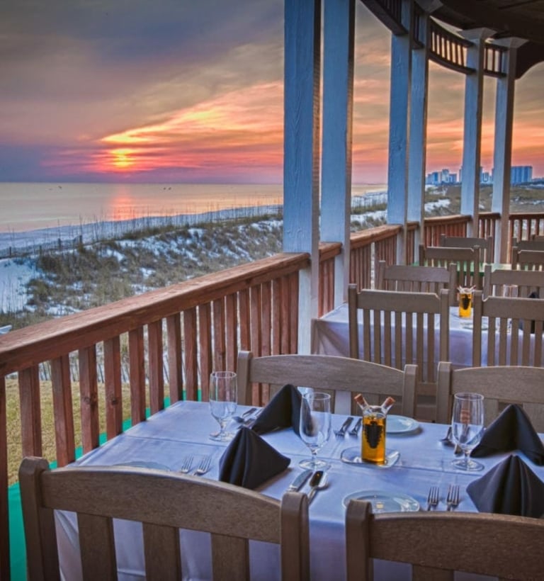 Outdoor dining with sunset view