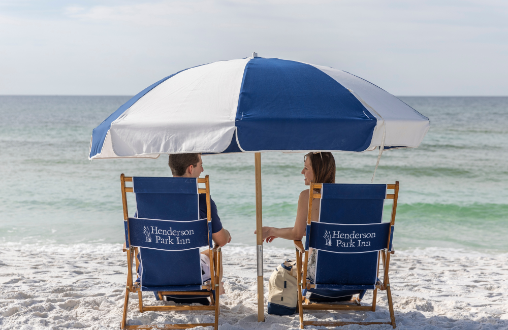 2 beach chairs with couple