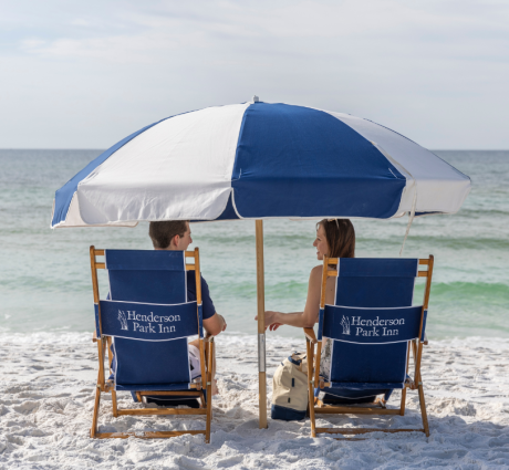 2 beach chairs with couple