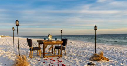 Romantic couples dinner setup on beach up