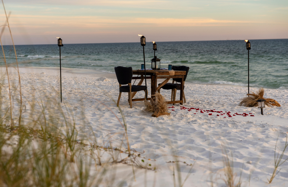 Romantic couples dinner setup on beach up