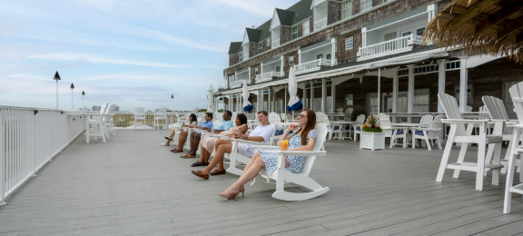 couples in rocking adirondacks